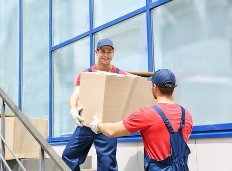 Man and van loading items in Charing Cross near central London streets